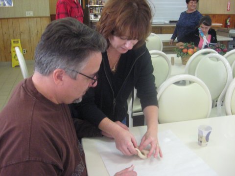 Terri and Peter Theodore from St. George in Fresno, CA making soft pretzels