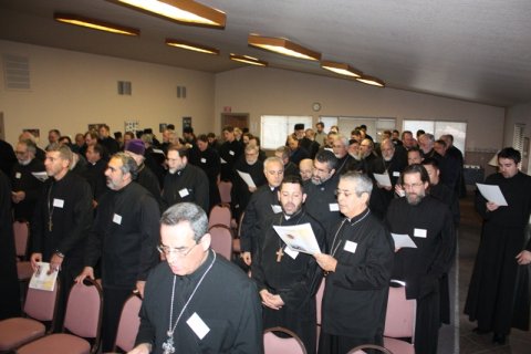 CLERGY: Clergy from throughout the west coast open the retreat by singing hymns and joining together in prayer.